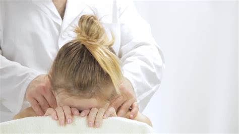 Young Woman Enjoying Relaxing Massage .